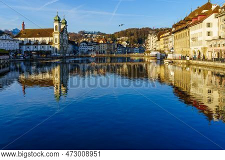 Lucerne, Switzerland - February 20, 2023: View Of The Jesuit Church St Francis Cavier, And The Reuss