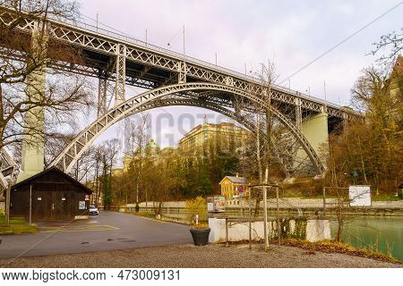 Bern, Switzerland - February 23, 2023: View Of The Aare River And The Kirchenfeldbrucke Bridge, In B