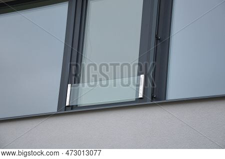 Modern Windows With A Gray Frame In The Family Form Functionalist Style With Protection Against Chil