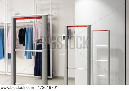 Close Up Anti-theft System In A Clothing Store. Entrance Gate With Scanner To Prevent Theft