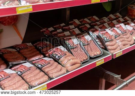 Chisinau, Moldova - October 6, 2022: Uncooked Fresh Meat Sausages And Moldovan Cutlets (mititei) On 
