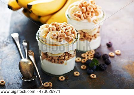 Yogurt Parfait With Cereal, Banana And Maple Syrup