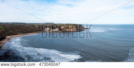 An Aerial View Of The North Yorkshire Fishing Village And Tourist Destination Of Runswick Bay On The