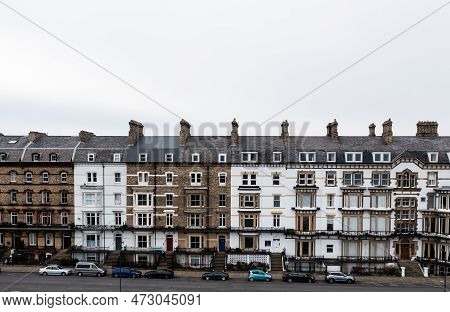 Saltburn, England, Uk - March 11, 2023.  Aerial View Of A Rown Of Old Victorian Townhouses With Many