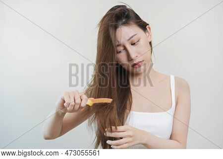 Damaged Hair, Frustrated Asian Young Woman, Girl Hand In Holding Brush Splitting Ends Messy While Co