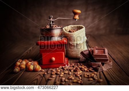 A Coffee Grinder And Coffee Background A