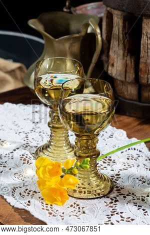 Antique German Glassware, Old Dutch Style Rummer Or Roemer Glasses With White Wine On White Lace Tab