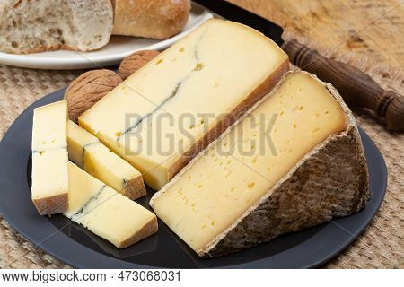 Cheese Collection, French Cheeses Morbier Semi-soft Cow Milk Cheese With Black Mold Layer And Tomme 