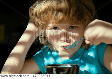 Kids Homefood. Boy Eats Soup. Healthy Nutrition For Children. Organic Home Food.