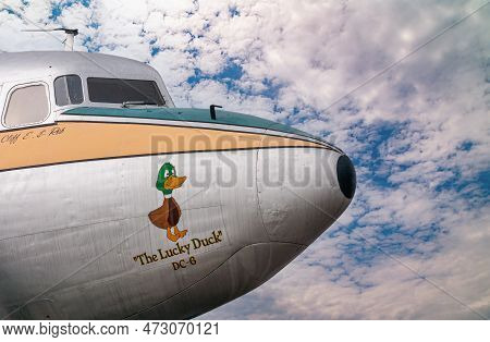 Fairbanks, Alaska, Usa - July 27, 2011: Closeup Of The Lucky Duck Dc-6 Nose Against Blue Cloudscape.