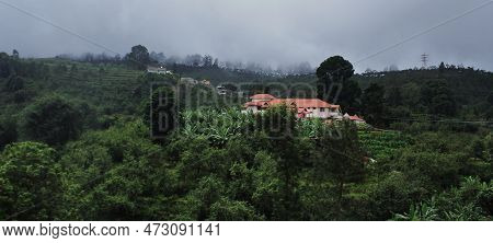 Rain Bearing Monsoon Clouds Over Western Ghats Mountains In South India, In Late Summer Season