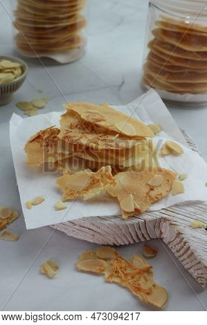 Crispy Almond Biscuits On A Wooden Tray