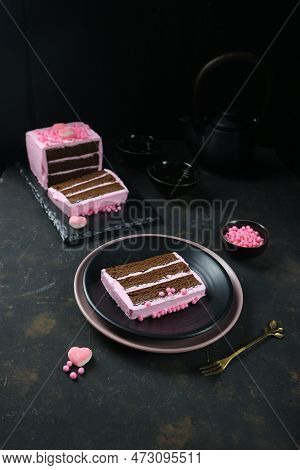 Chocolate Layer Cake Covered With Pink Cream