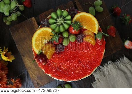 Fruit Cakes Are Served On A Wooden Tray