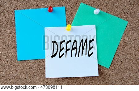 Defame - Word On Colorful Pieces Of Paper Attached To The Note Board. Info Concept
