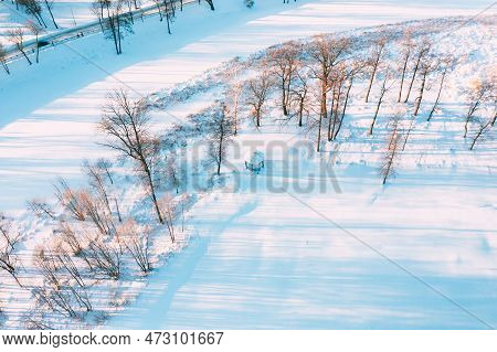 Aerial View Flight Above Frozen Creek. Amazing Aerial View On Freezing River. Scenic View Of Nature.