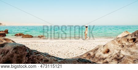 Side View Tourist Woman In Bikini Walk On White Sand Beach Alone In Persian Gulf Mirellas Island. Mu