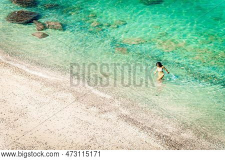 Aerial View Isolated Tourist Woman In Bikini Walk On White Sand Beach Alone In Persian Gulf Mirellas