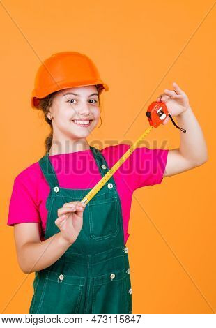 Length. Construction Worker With Tape Measure. Cute Kid As A Construction Worker. Kid Repairing Home