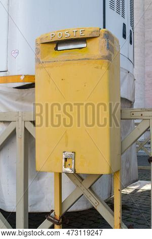 Vatican City, Vatican - December 7, 2022: Yellow Poste Vaticane (vatican Post) Mailbox.