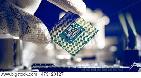 Microprocessor Or Cpu Is Held In The Hand Of A Laboratory Technician. Central Processing Unit, Cpu S