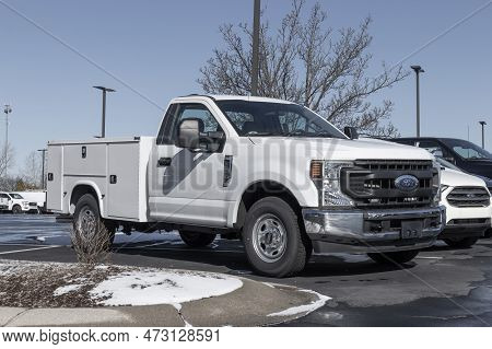 Zionsville - Circa March 2023: Ford Super Duty F-250 Utility Cab Display In Snow. Ford Offers The Su