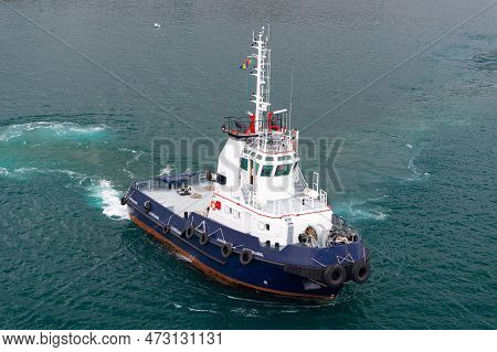 Tugboat In The Sea Water. Marine Tugboat In Sea. Photo Of Tugboat. Tugboat Outdoor