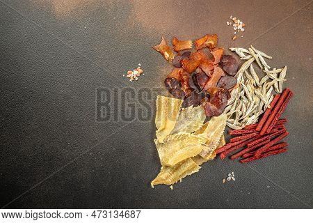 Variety Of Dried Fish, Snacks For Beer On A Dark Background. Place For Text, Top View.