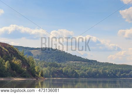 Lake Surrounded By Green Forest, Hill With Forest On Background.summer Day