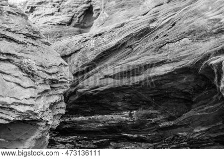 A Black And White Photo Of Some Rocks