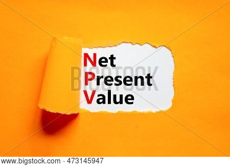 Npv Net Present Value Symbol. Concept Words Npv Net Present Value On White Paper On A Beautiful Oran