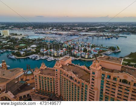 Harborside Villas at sunset aerial view and Paradise Island Bridge at Nassau Harbour, from Paradise Island, Bahamas.