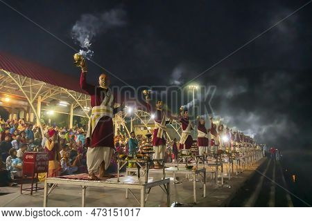 Tribeni Ghat, Rishikesh, Uttarakhand - 29th October 2018 : Ganga Aarti Being Performed By Hindu Prie