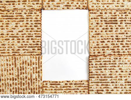 Pesach Celebration Concept - Jewish Holiday Pesach. Frame From Square Matzah Isolated On White Backg