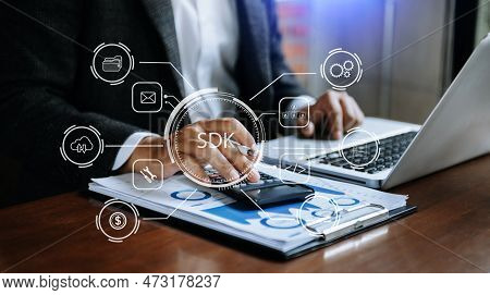 Sdk  Software Development Kit Programming Language Technology Concept, Person Typing Laptop Computer