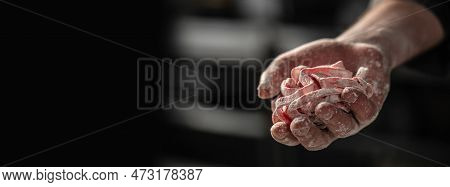 Male Hands Holding Handmade Noddle Pasta On A Dark Background. Long Banner Format.
