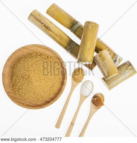 White Sugar, Brown Sugar And Sugar Cane Panela On White Background