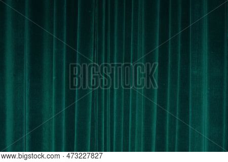Vertical Fold On Green Velvet Curtains For Background And Design. Soft Focus