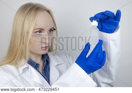 Niacinamide. Girl Applies Vitamin B3 To Her Face. Laboratory Research. Skincare. Dermatological Seru