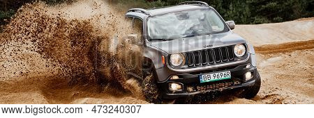 Fun In The Desert With A 4x4 Car. Jeep Renegade Is Doing Great In The Slushy Sand. Siedlce Desert, P