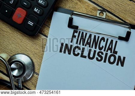 Concept Of Finansial Inclusion Write On Paperwork Isolated On Wooden Table.
