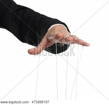Woman Pulling Strings Of Puppet On White Background, Closeup