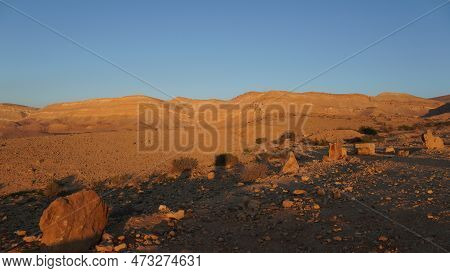 Negev Desert Landscape At Sunrise On The Bottom Of The Crater Makhtesh Gadol, In The South Of Israel