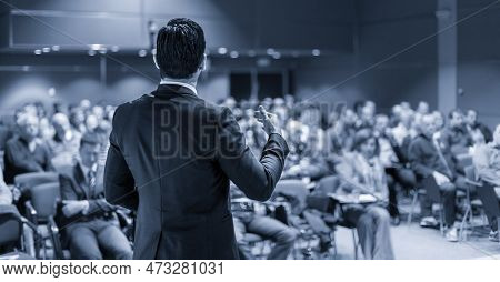 Speaker At Business Conference With Public Presentations. Audience At The Conference Hall. Entrepren
