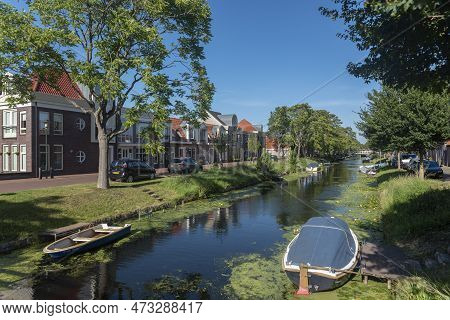Enkhuizen, Netherlands - August 02, 2022: Typical Canal At Norder Boerenvaart In The City Center. En