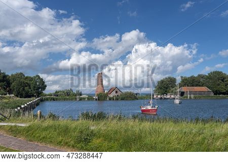 Enkhuizen, Netherlands - August 03, 2022: Landscape With Historical Lime Kilns In The Zuiderzeemuseu