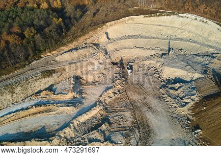 Aerial View Of Open Pit Mine Of Sandstone Materials For Construction Industry With Excavators And Du