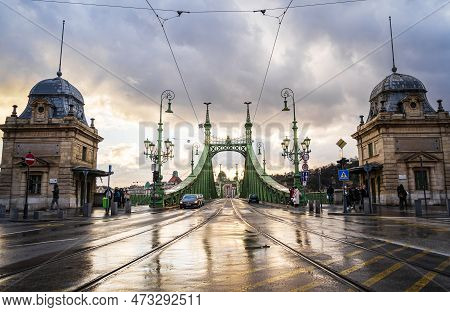 Liberty Or Freedom Bridge In Budapest After The Rain. The Old Green Bridge Connects Buda And Pest Ac