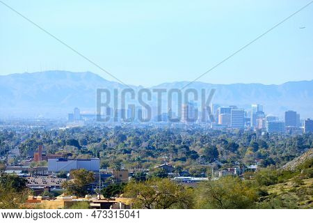 High Rise Buildings Of Phoenix Downtown In The Valley Of The Sun With A Backdrop Of South Mountains 
