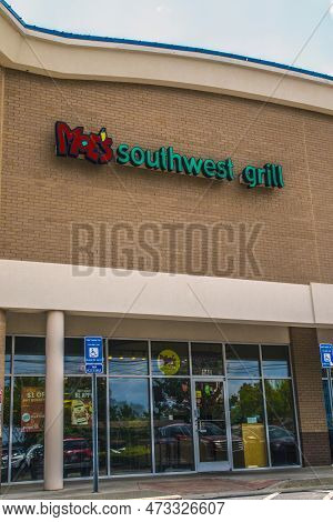 Snellville, Ga Usa - 07 15 20: Moes Southwest Grill Fast Food Take Out Exterior Building Sign